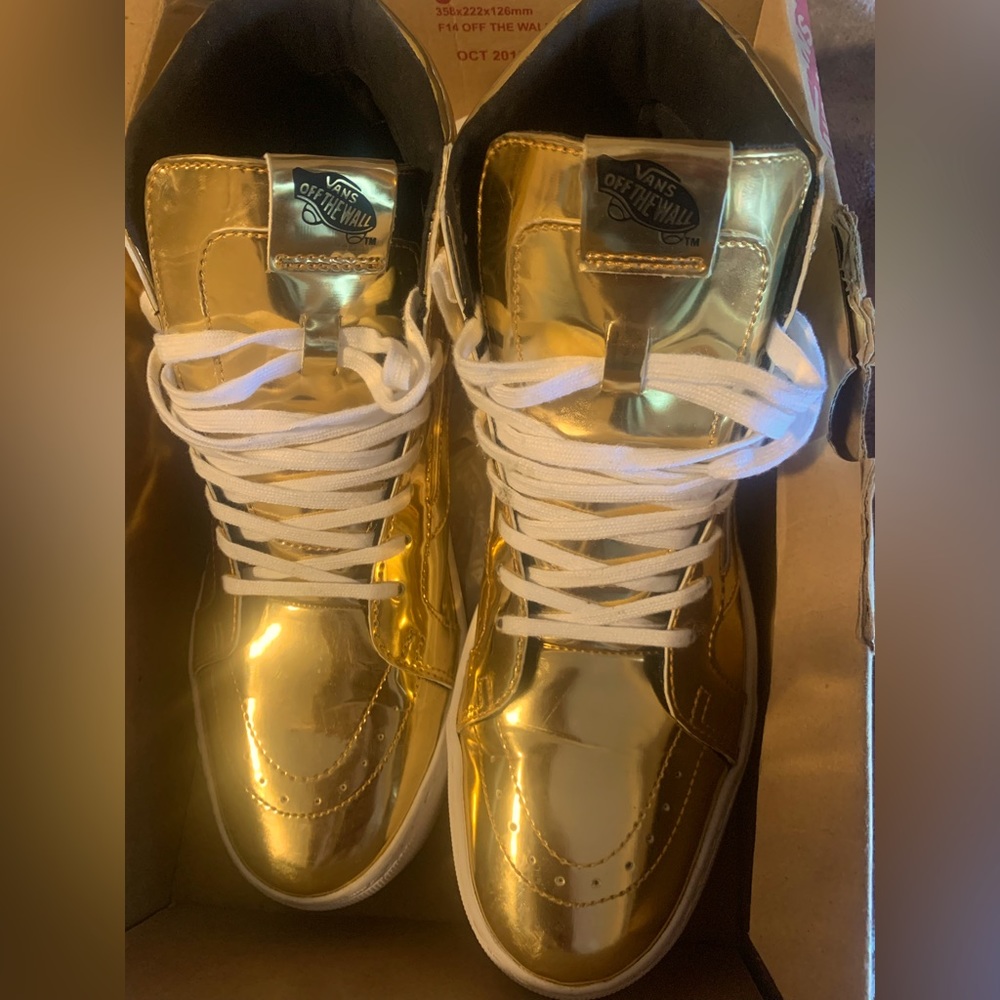 All Gold Vans with white laces and bottom